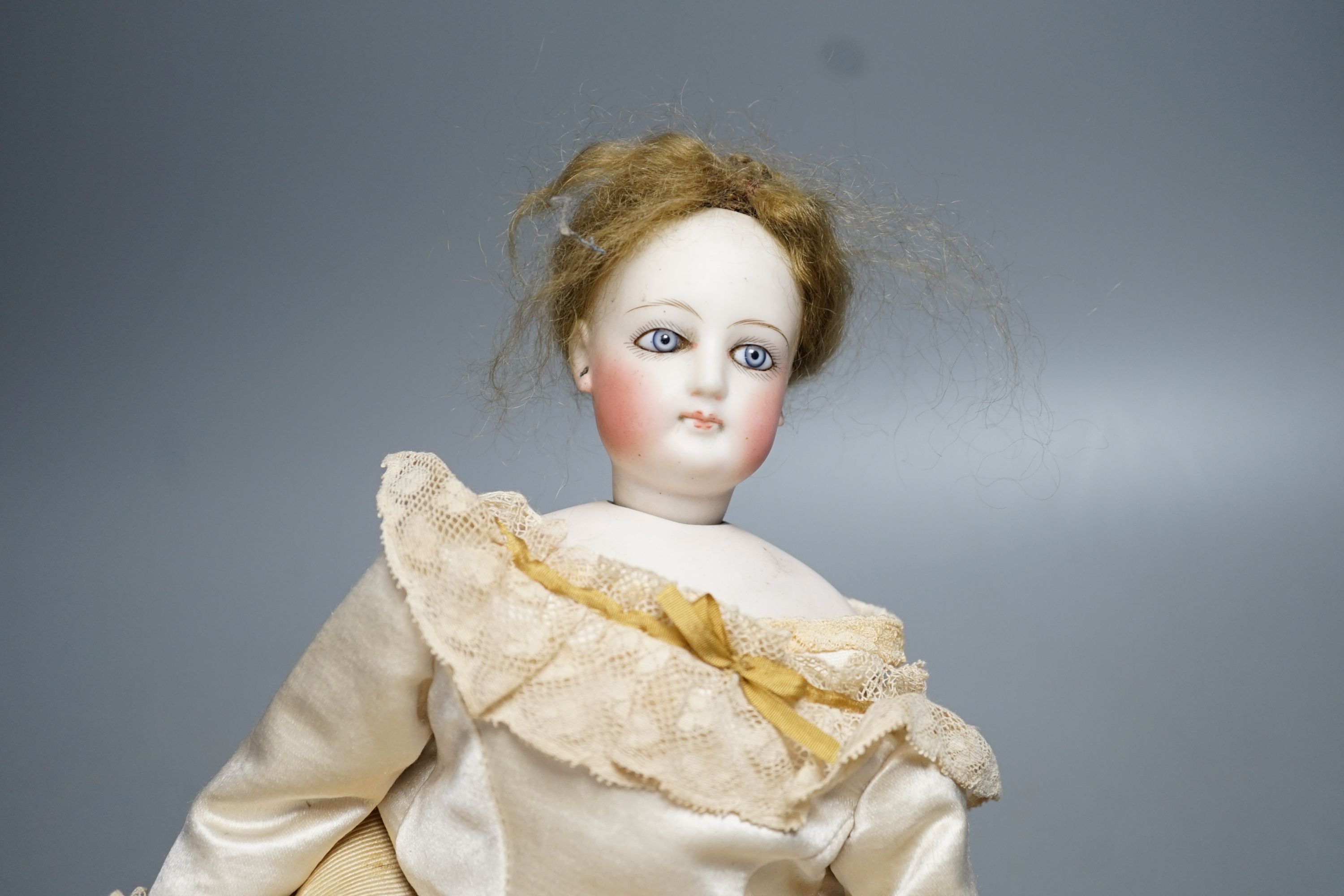 An S.G. bisque shoulder head French fashion doll c.1875, cork pate mohair wig attached, swivel neck, - Image 4 of 11