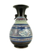 A Chinese underglaze blue and copper red vase, Xuande mark, 19th century, the brown glazed neck