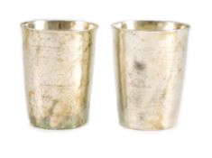 A pair of George III part textured silver beakers, by Henry Chawner, with engraved crest, London,