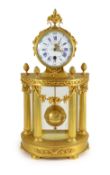 An early 20th century French ormolu 400 day mantel clock, in architectural case with floral