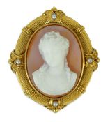 An early 20th century gold, sardonyx hardstone cameo and split pearl set oval brooch, carved with