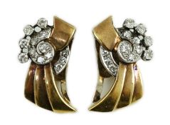 A pair of 1940's/1950's continental gold and diamond cluster set fan shaped ear clips, 26mm, gross