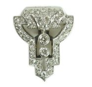 A 1930's Art Deco white gold and diamond cluster openwork clip brooch, set with round cut stones,