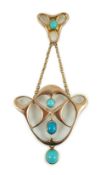 An Edwardian Art Nouveau 9ct gold and turquoise set drop pendant, of openwork design, overall