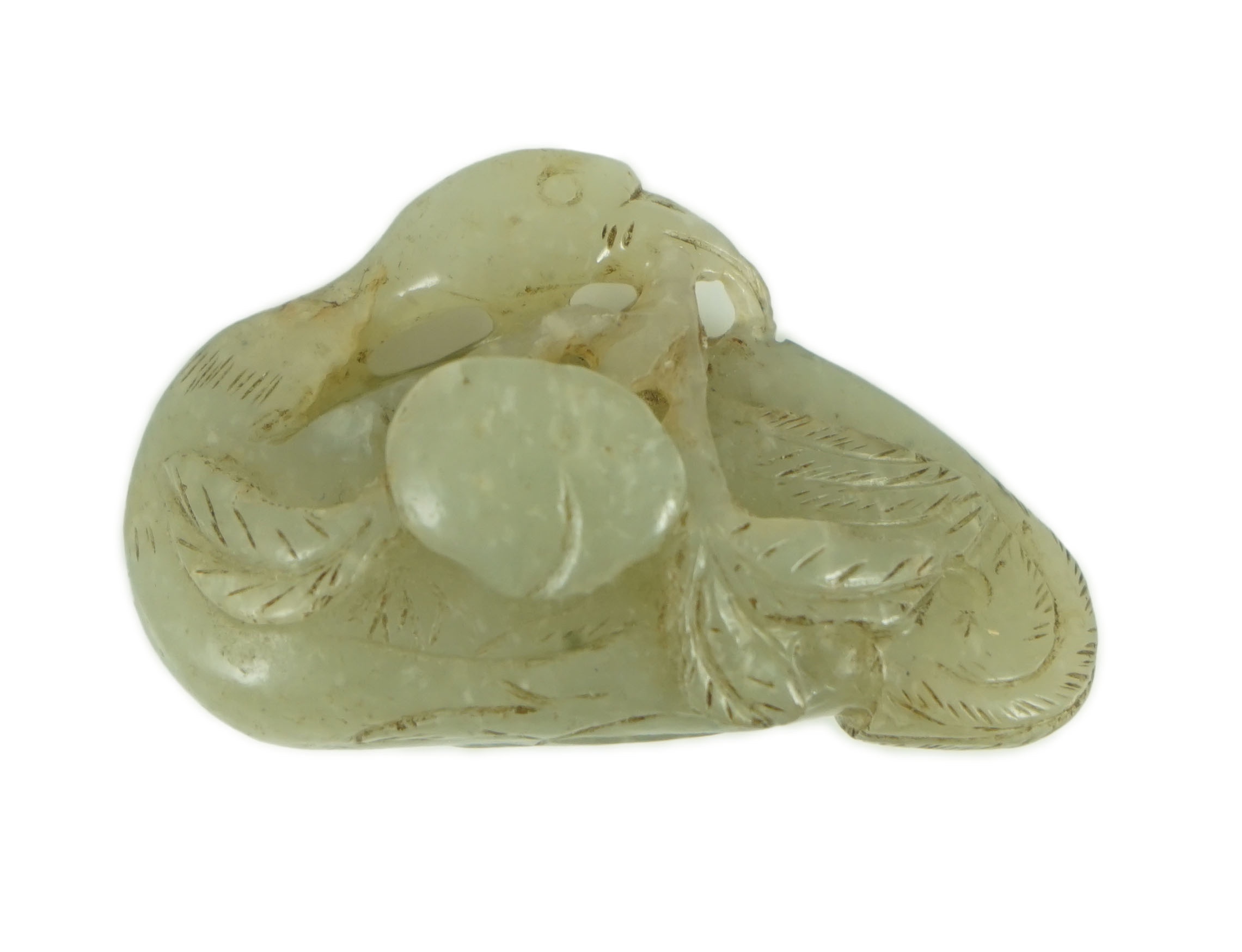 A Chinese pale celadon jade carving of a duck, possibly Jin-Yuan dynasty its head turned backward