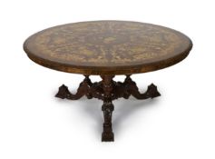 A Victorian walnut and marquetry breakfast table, of unusually large proportions, the circular top