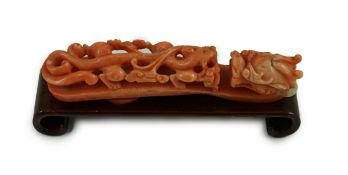 A rare Chinese coral 'dragon' belt hook 18th/19th century, carved in high relief and open work