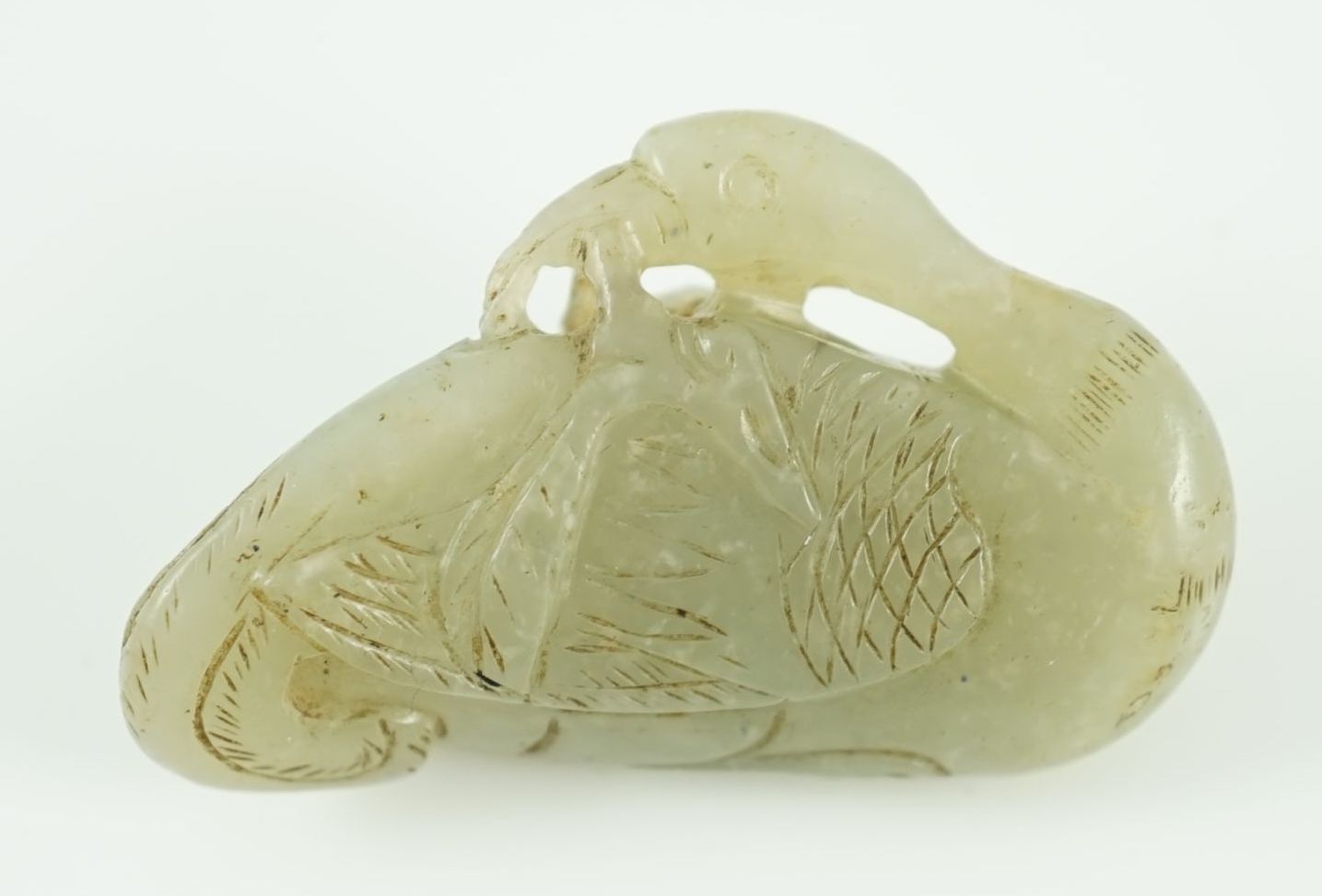 A Chinese pale celadon jade carving of a duck, possibly Jin-Yuan dynasty its head turned backward - Image 3 of 5
