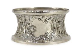 A George III Irish silver dish ring, maker, R.B?, decorated with continuous hunting scene amid