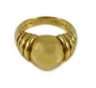 A Boucheron 750 gold dress ring, with spherical ring head and fluted shoulders, numbered