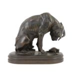 Henri-Alfred-Marie Jacquemart (French, 1824-1896). An animalier bronze group of a hound looking at a