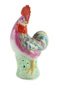 A Chinese enamelled porcelain model of a rooster, Jiaqing period, 29cm high, restorationThe comb