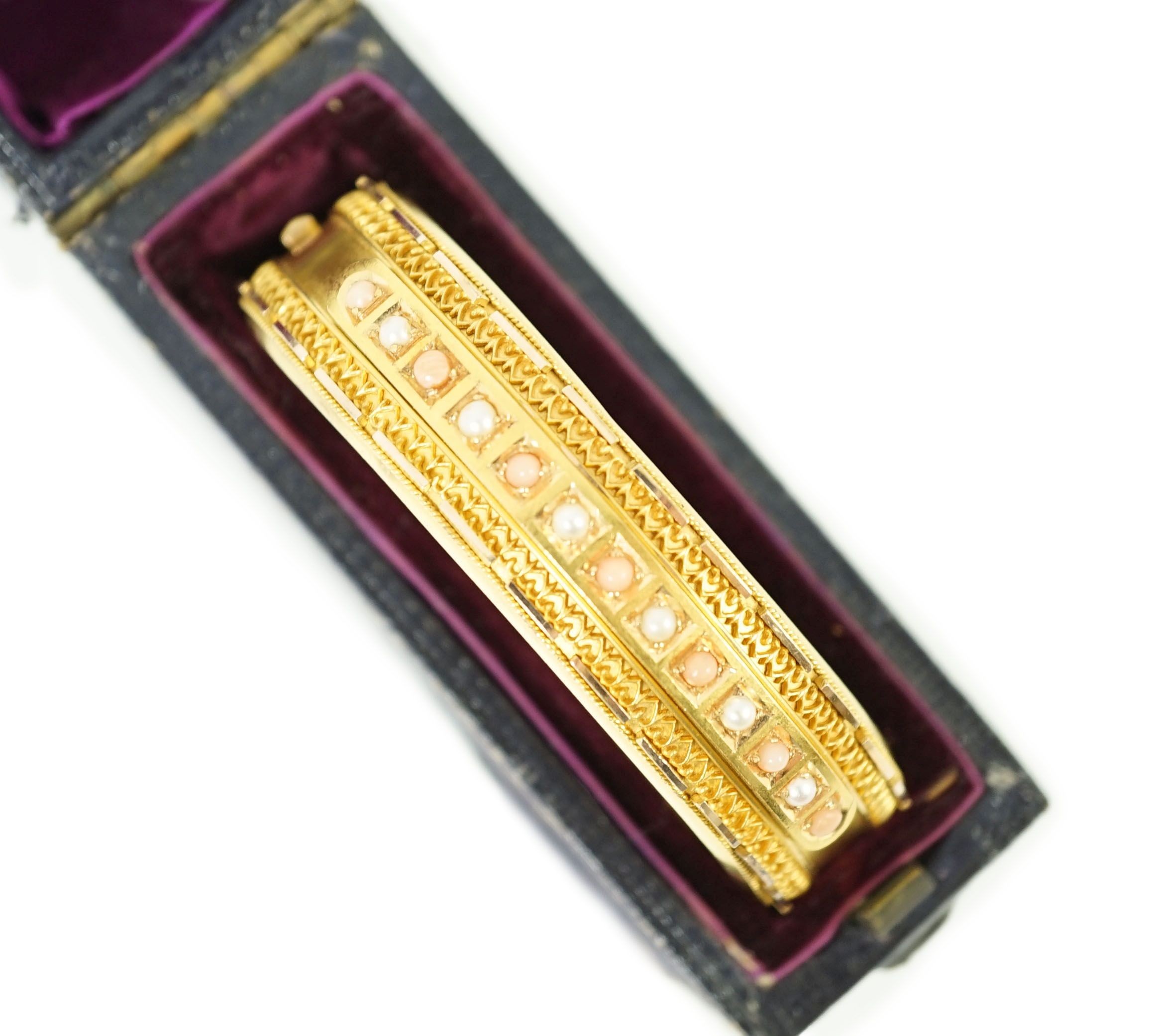 A late Victorian 15ct gold coral bead and seed pearl set part cannetile work hinged bangle, inner - Image 8 of 11