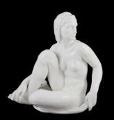 Robert Ullmann (1903-1966) for Meissen, a white glazed porcelain figure of a seated female nude,