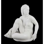Robert Ullmann (1903-1966) for Meissen, a white glazed porcelain figure of a seated female nude,