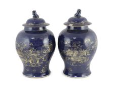 A pair of Chinese gilt-decorated blue ground baluster vases and covers, 19th century, each decorated