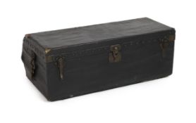 A Louis Vuitton motoring trunk, with studded black leather covering, and brass loop handles with