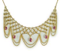 A 20th century 14k gold and five stone oval cut pink topaz set drop fringe necklace, 43cm, gross