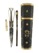 A George III gold mounted piqué work etui, the interior with three (ex five) implements, 9cm.Cased