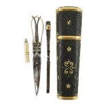 A George III gold mounted piqué work etui, the interior with three (ex five) implements, 9cm.Cased