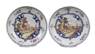 A pair of Chinese export European subject saucer dishes, Qianlong period, each painted with European