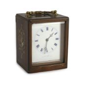 Paul Garnier of Paris. A mid 19th century French inlaid rosewood travelling carriage timepiece, with