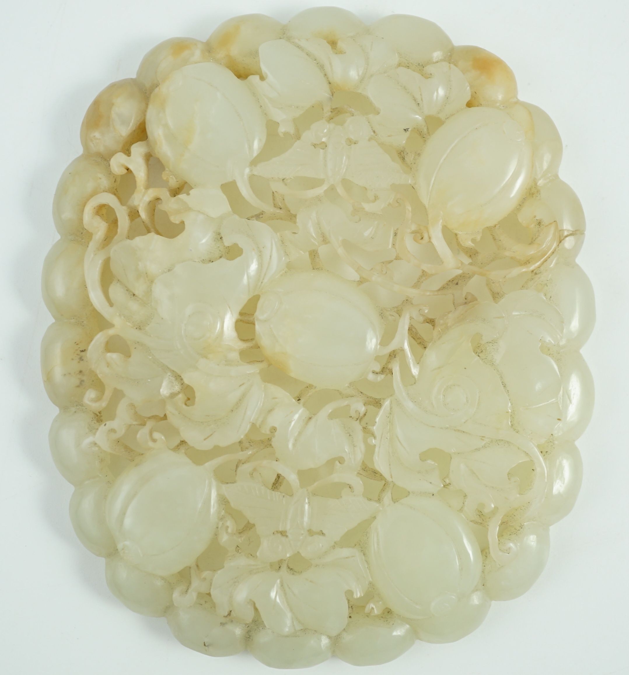 A Chinese pale celadon jade oval openwork plaque, 19th century, probably taken from a ruyi - Image 3 of 10