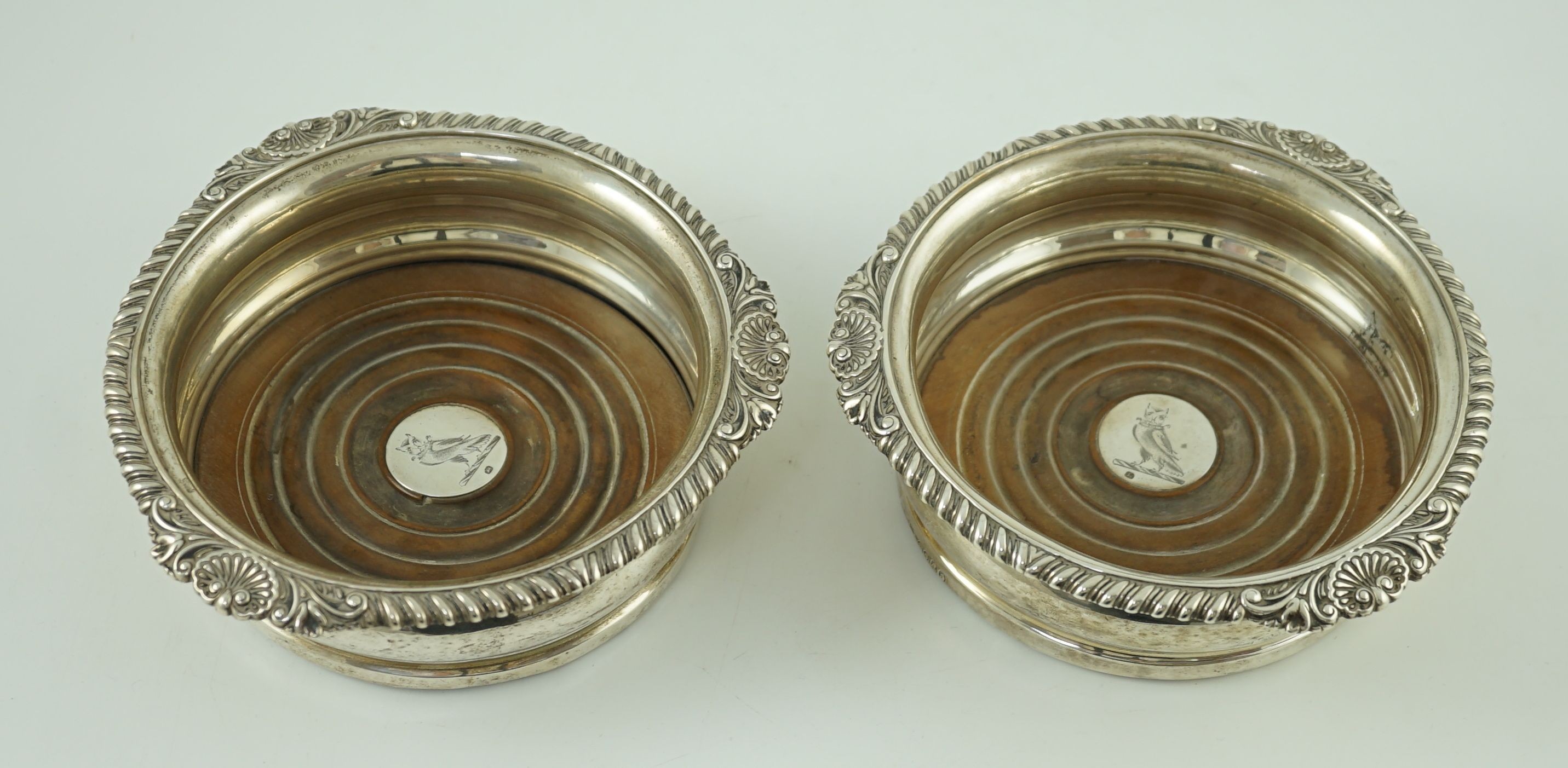 A pair of George IV silver wine coasters by Benjamin Smith III, with gadrooned and shell border, the - Image 6 of 11