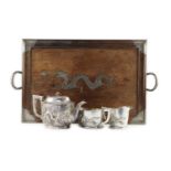 An early 20th century Chinese Export three piece silver tea set and matching silver inlaid
