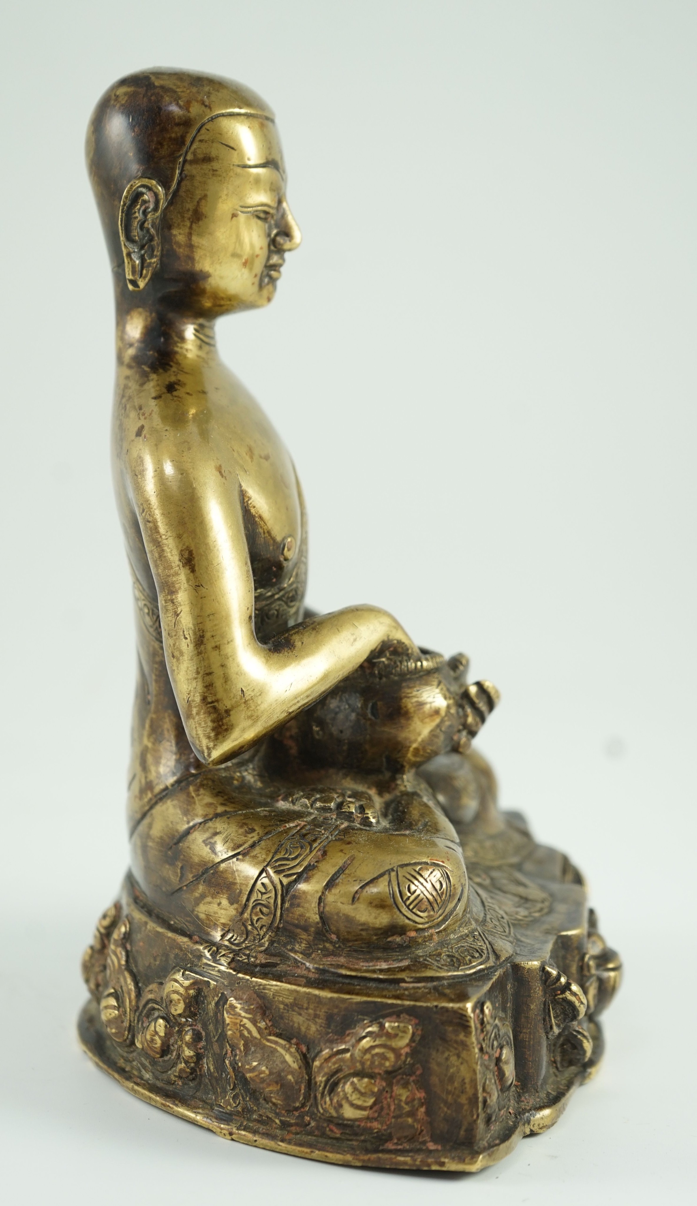 A Himalayan bronze figure of Buddha, 19th century, the seated figure holding an alms bowl, the - Image 3 of 6