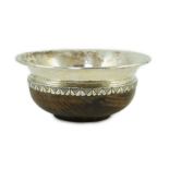 A George V Arts & Crafts planished silver mounted Mazar bowl, by Albert Edward Jones, diameter 14cm,