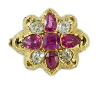 An early 20th century gold, four stone ruby and four stone diamond set brooch (adapted), of