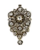 A 19th century gold, silver and diamond cluster drop pendant brooch, set with old mine stones,