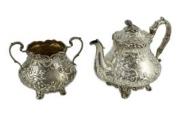 An early Victorian silver teapot and matching sugar bowl, by John Wellby, both engraved with