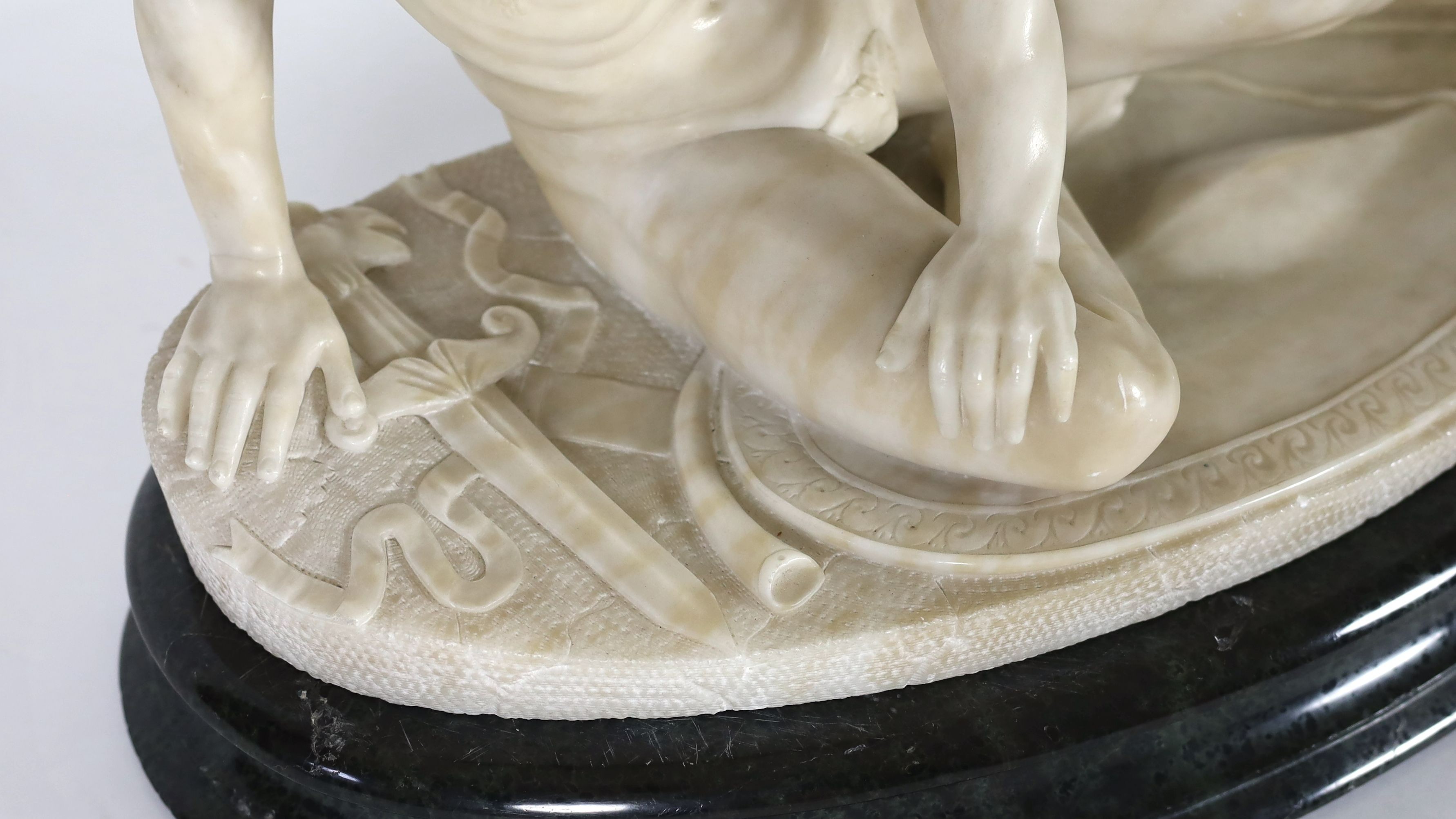 A late 19th century carved alabaster model of The Dying Gaul, on integral oval base, and moulded - Image 2 of 6