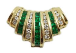 A 20th century 14kt gold, emerald and diamond set fan shaped pearl necklace ornament, set with seven