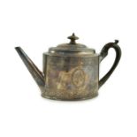A George III silver oval teapot, by Hester Bateman, with engraved decoration and applied monogrammed