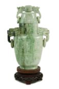 A Chinese archaistic jadeite two-handled vase and cover, first half 20th century, of flattened