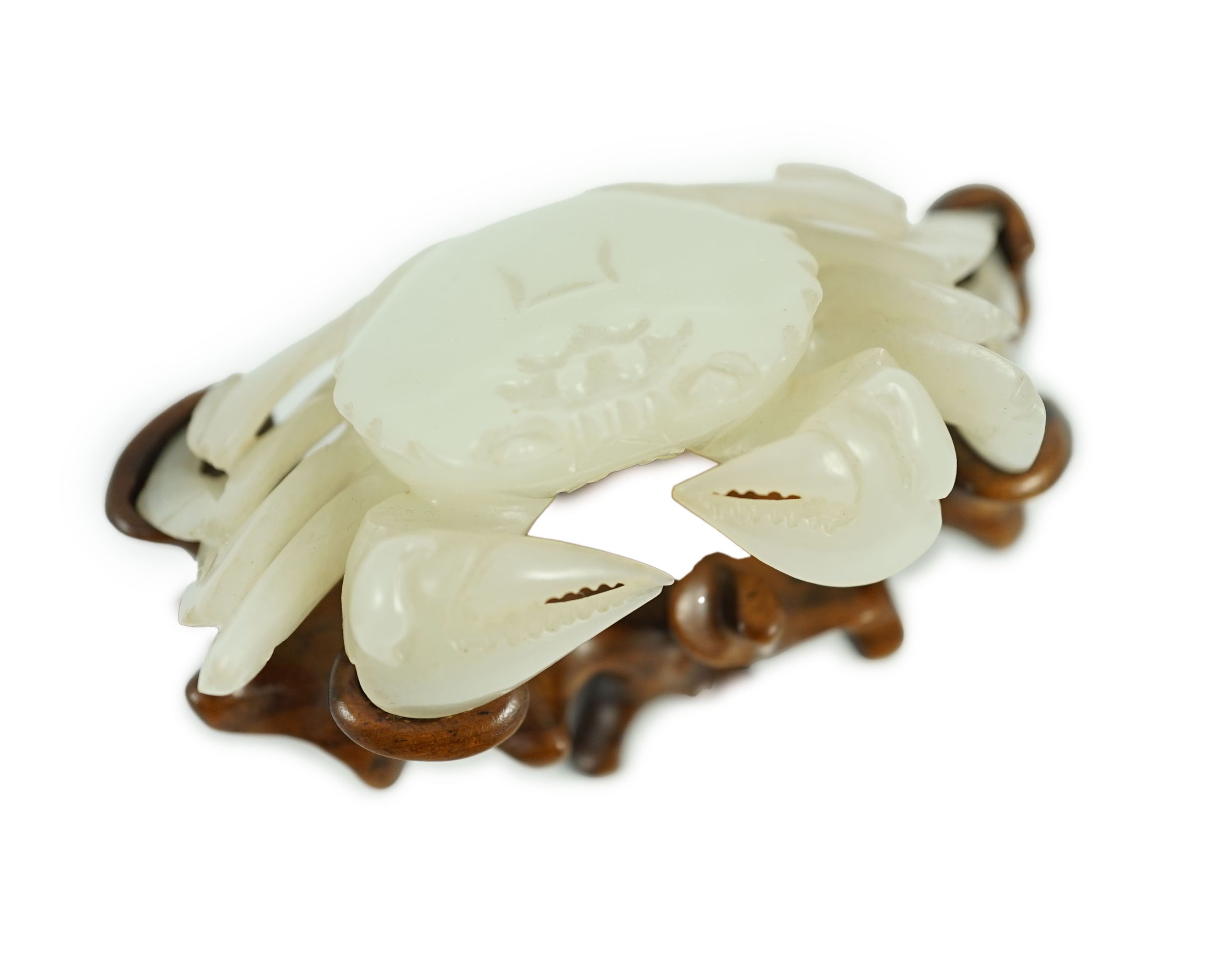 A Chinese pale celadon jade model of a crab, 20th century, Provenance- the vendor’s father