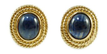 A 20th century pair of gold and cabochon sapphire set oval earrings, with 9ct butterflies, 17mm,