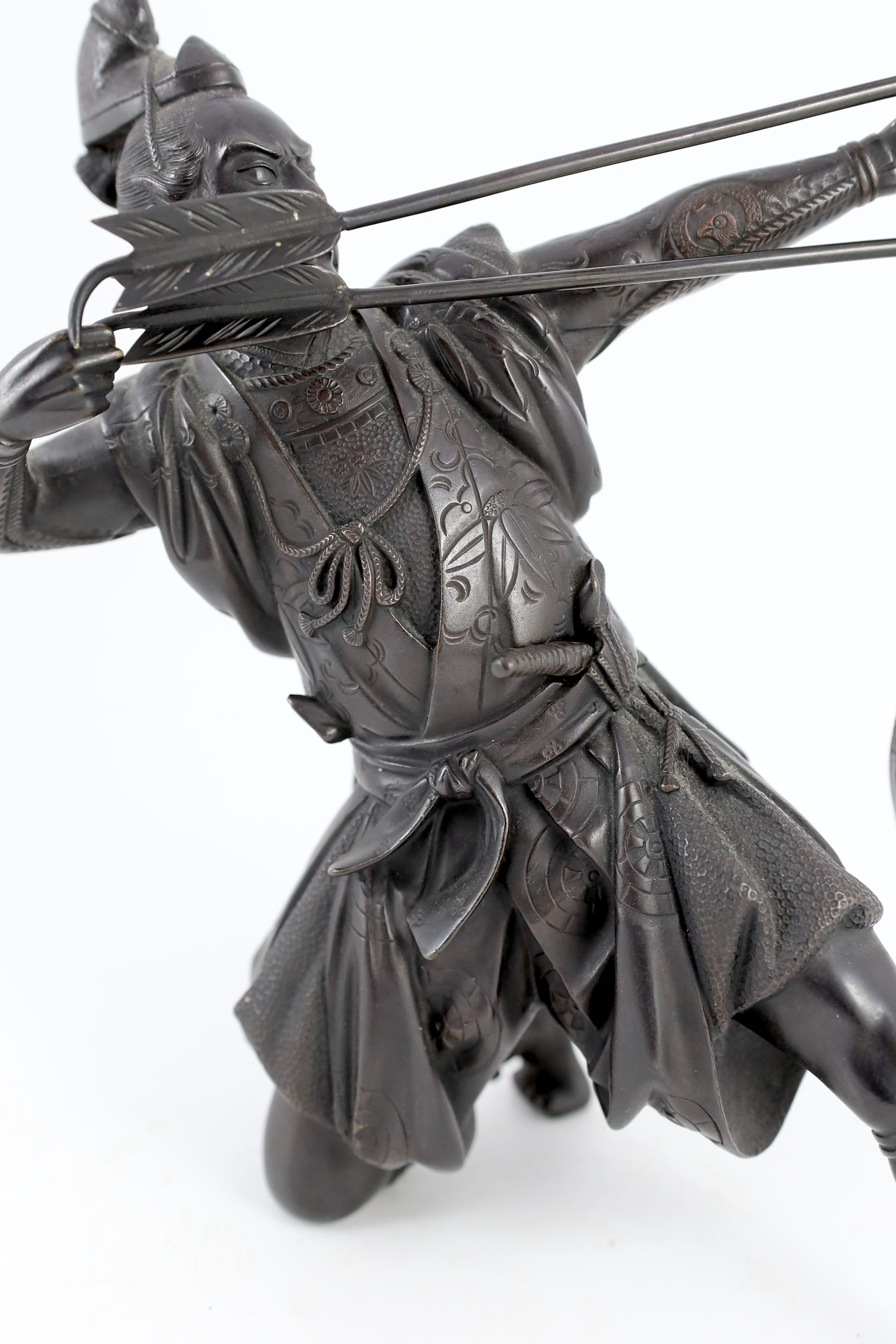 A Japanese bronze figure of a kneeling archer, Meiji period, signed to a raised tablet ‘…zan’ 40 - Image 3 of 7