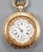 An early 20th century Swiss yellow metal open faced keyless fob watch, with Roman dial and gilt