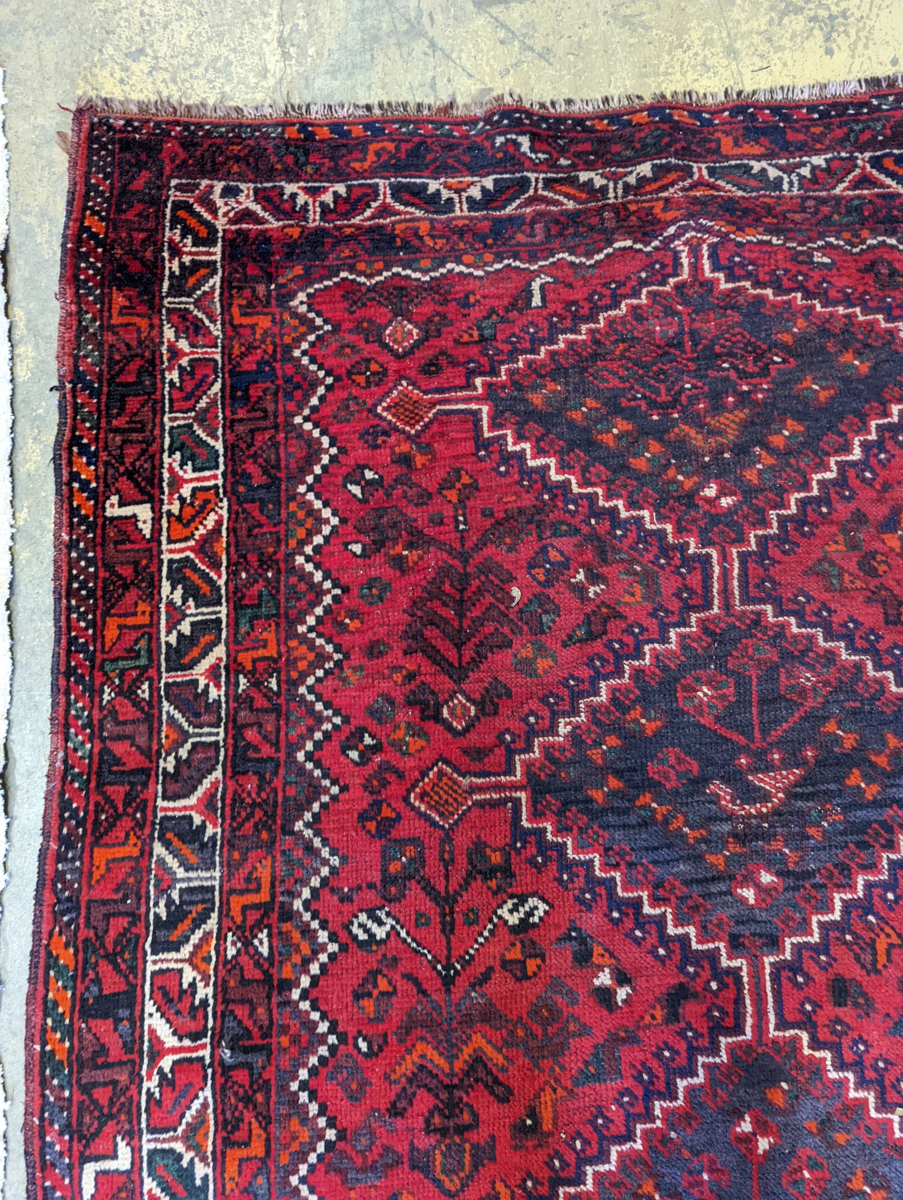 A Caucasian design red ground rug, 200 x 160cm - Image 5 of 5