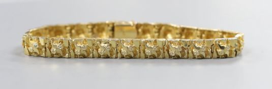 A modern textured 14ct bracelet, 18cm, 22.8 grams.