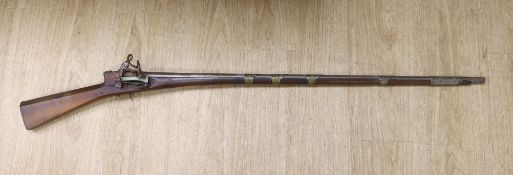 An Eastern decoratively metal mounted antique musket,132cms long.