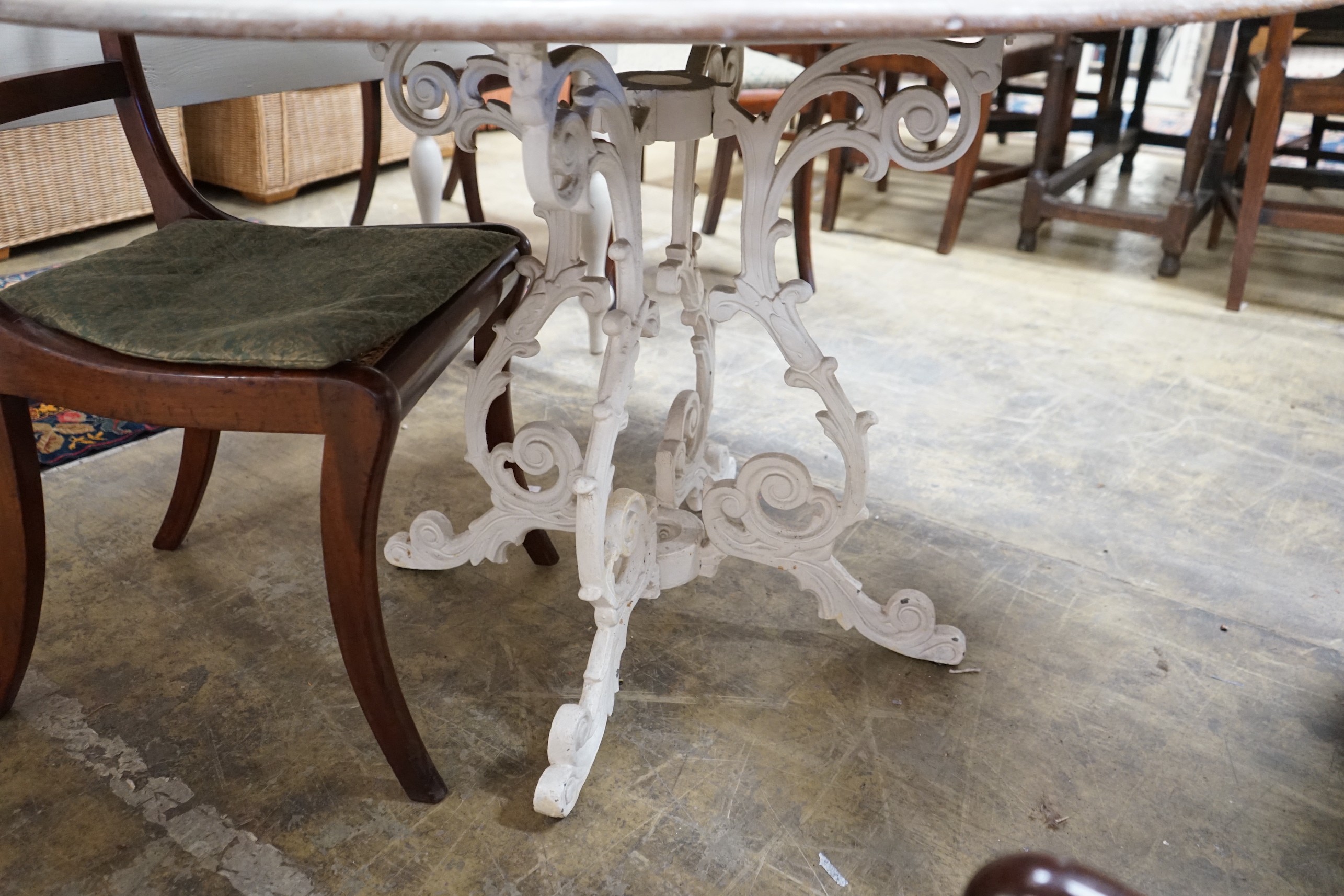 A Victorian style circular painted pine circular dining table on painted cast metal base, diameter - Image 4 of 4