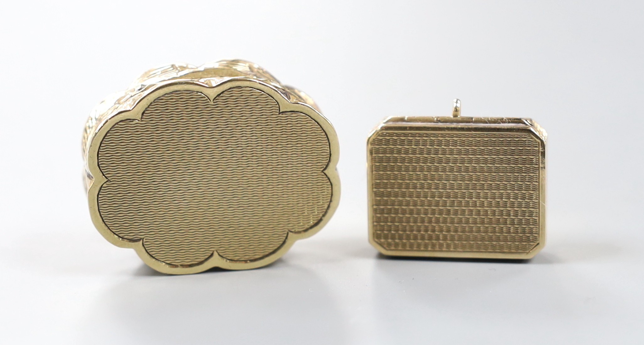 A 1960' 9ct gold shaped oval pill box, 35mm, 22.5 grams and a 9ct gold pill box by Asprey & Co,