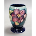 A small Moorcroft clematis vase, 15.5cm