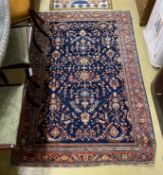 A North West Persian blue ground rug, 200 x 130cm