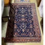 A North West Persian blue ground rug, 200 x 130cm